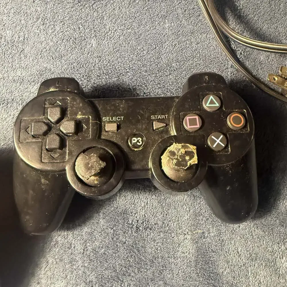 Sony PlayStation 3 Slim CECH-3001A Charcoal Black Console with Two Controllers